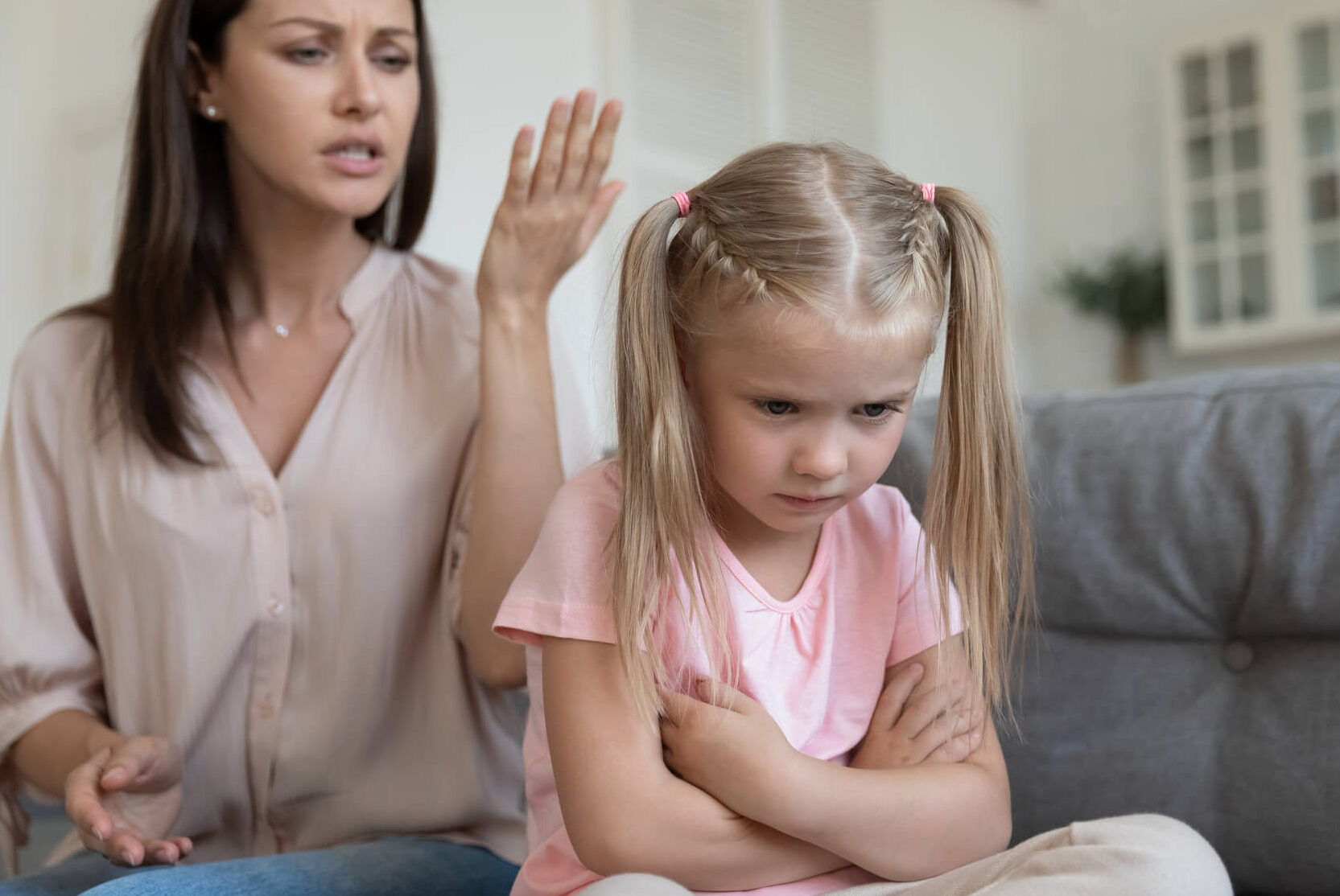 Image of critical mother and upset daughter to depict a pattern of negative childhood experience involving unmet emotional needs that unpin the development of early maladaptive schema